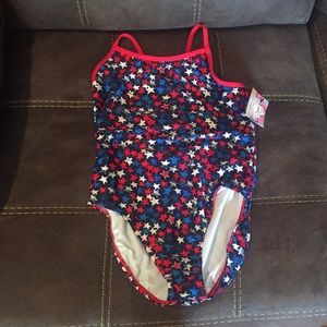 Brand new “Op” red white and blue stars one piece